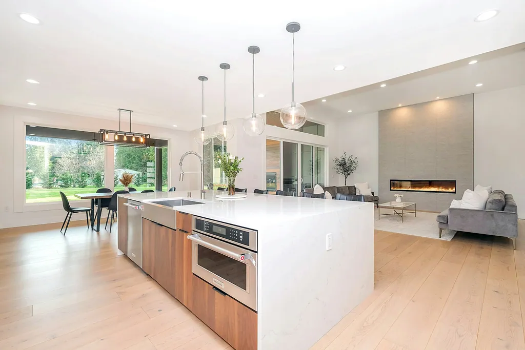 A bright open-plan kitchen and living space in daylight